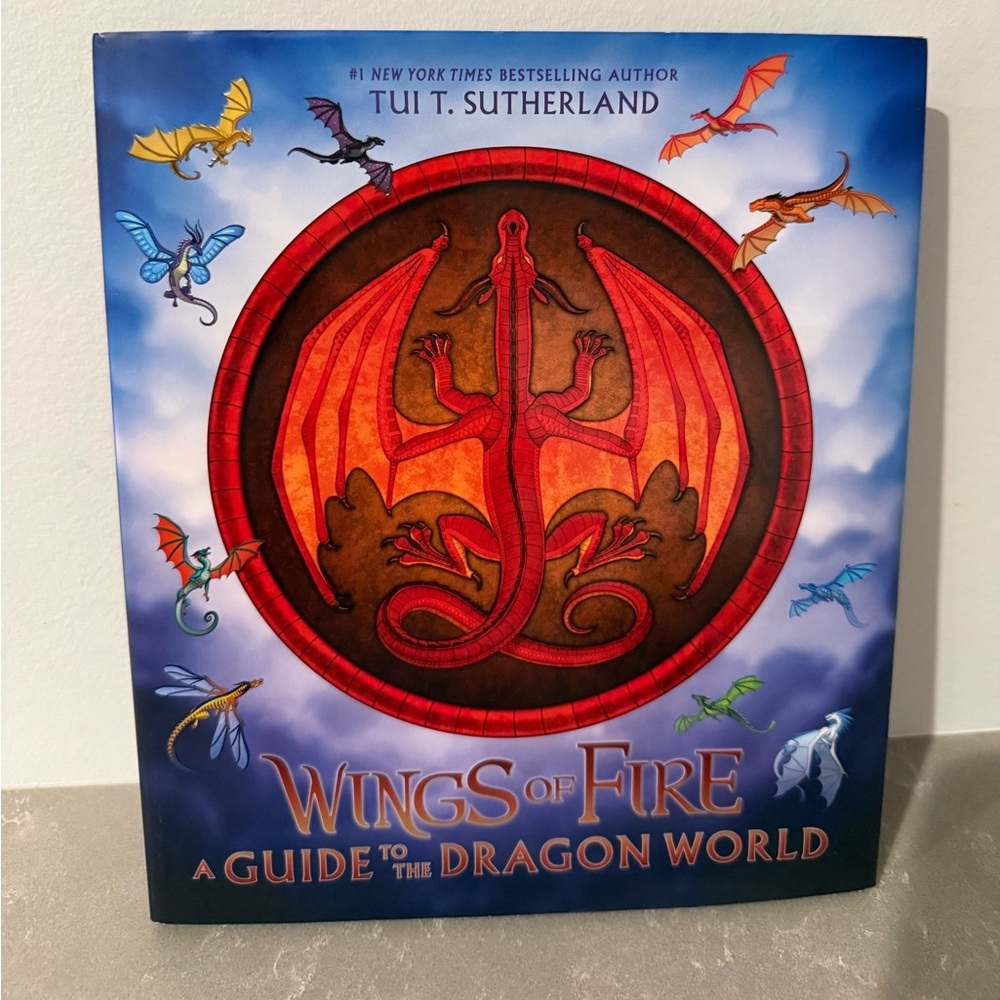 Wings of Fire: A Guide to the Dragon World by Tui T. Sutherland - Gently Used